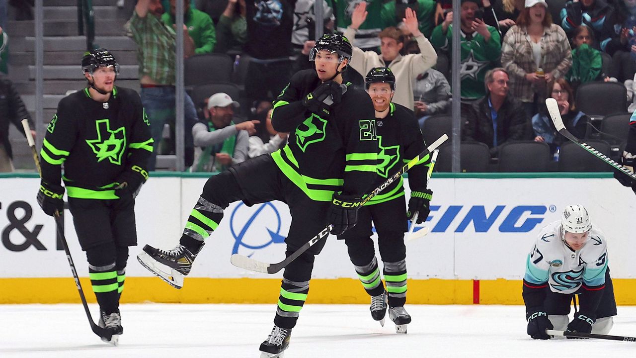 Dallas Stars left wing Jason Robertson (21) celebrates a goal against the Seattle Kraken during the second period of an NHL hockey game on Saturday, April 13, 2024, in Dallas. (AP Photo/Richard W. Rodriguez)