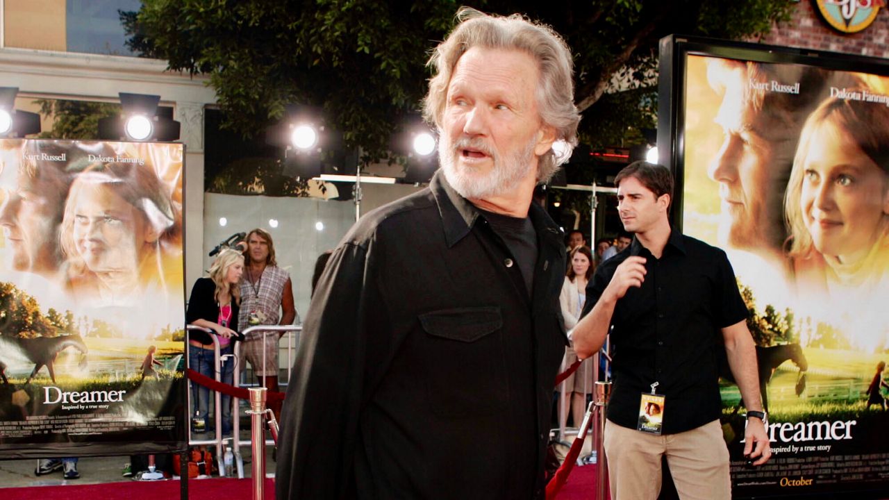 FILE - Actor Kris Kristofferson walks down the red carpet during the premiere for his new movie "Dreamer," Oct. 9, 2005, in the Westwood section of Los Angeles. (AP Photo/Ric Francis, File)