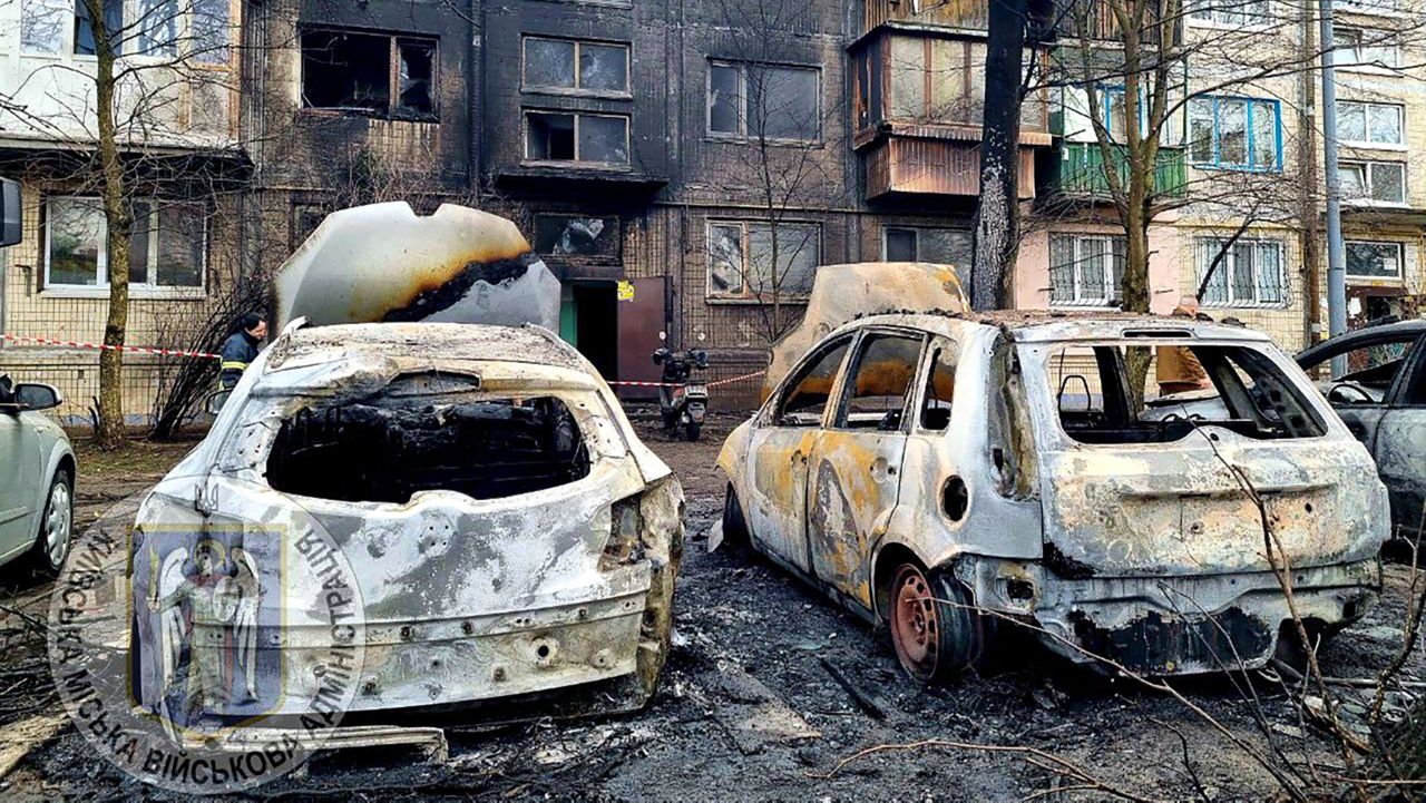 In this photo provided by Serhii Popko, the head of the city's military administration, burned cars are seen at the site after Russian attacks in Kyiv, Ukraine, Thursday, March 21, 2024. (Serhii Popko, the head of the city's military administration via AP)