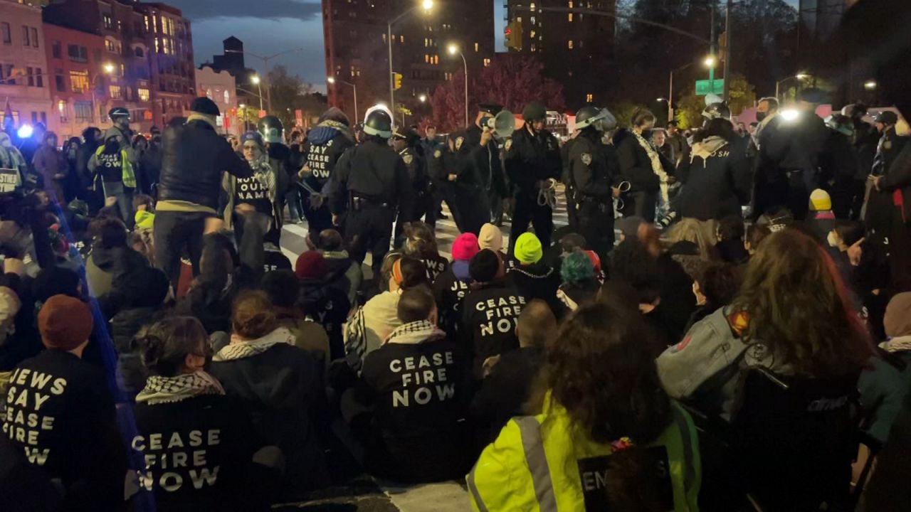 Protesters were participating in what they called a “Seder in the streets,” blocking traffic. (Spectrum News NY1)