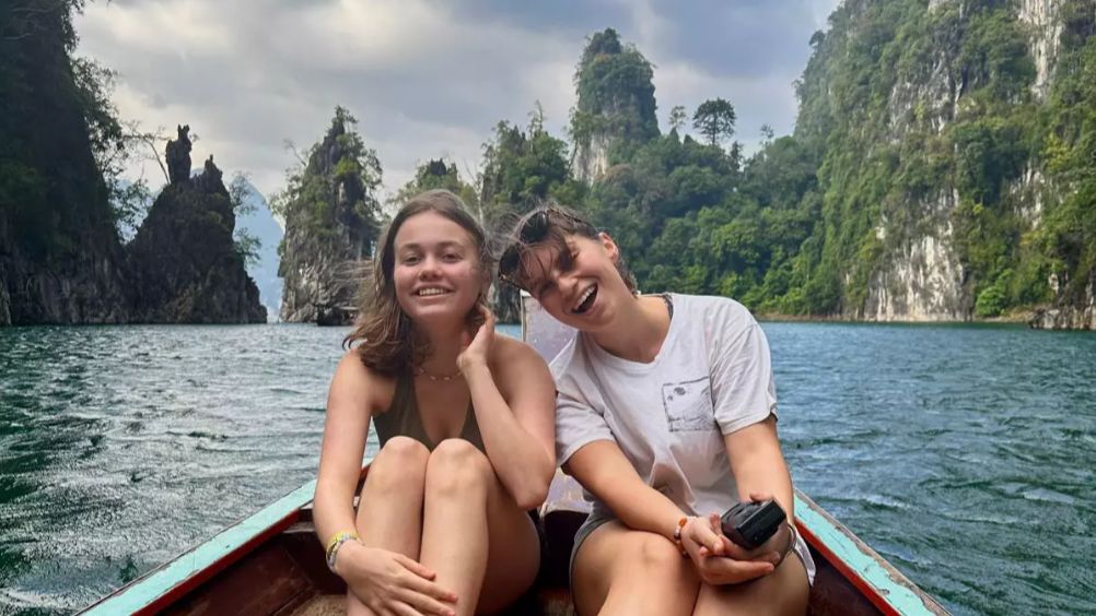 German tourists Charlotte Pohl, left, and Maria Lepere take a boat ride at Khao Sok National Park in Thailand in January. They were detained several weeks later by U.S. immigration officials in Honolulu for 24 hours before being denied entry into the United States. (Courtesy of Maria Lepere)