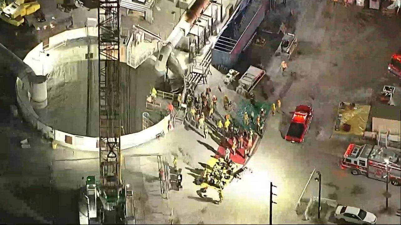 This image taken from footage provided by KABC/ABC7 Los Angeles shows first responders working the scene after a tunnel collapsed on Wednesday, July 9, 2025, in Los Angeles. (KABC/ABC7 Los Angeles via AP)