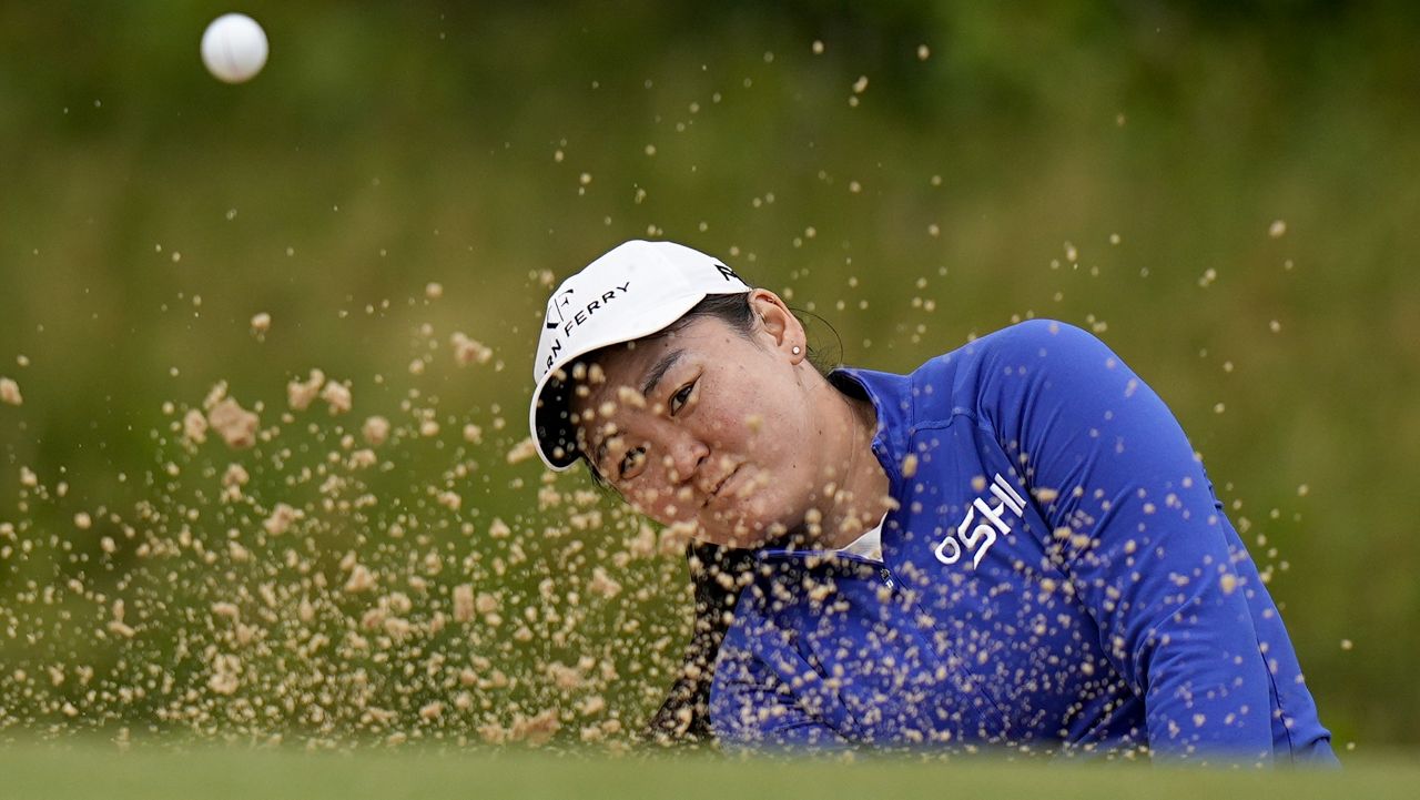 Punahou graduate Allisen Corpuz hit out of the sand on the No. 8 hole during the final round of the Chevron Championship tournament at The Club at Carlton Woods on Sunday.