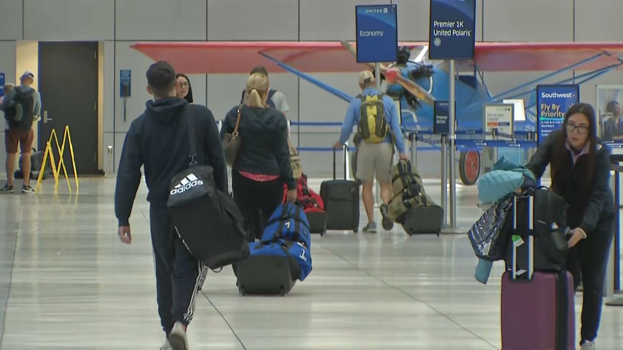 Labor Day weekend brings low travel prices, record crowds