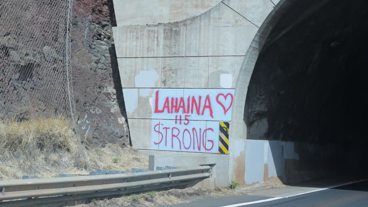 A photo from Maui shows "Lahaina Strong" written along Honoapiilani Highway. (Brian McInnis/Spectrum News)