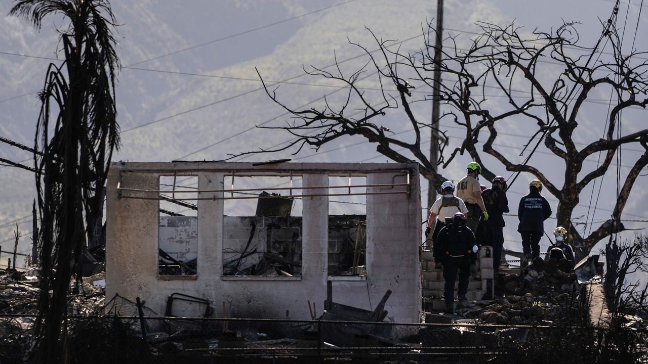 Under the Federal Disaster Tax Relief Act, survivors of the Maui wildfires would be exempted from paying federal income tax on settlement money or attorney fees included in a settlement related to the fires. (Associated Press/Jae C. Hong)