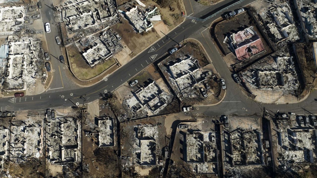 A UHERO survey found that fire-affected households in West Maui continue to struggle with housing, employment and other issues. (Associated Press/Jae C. Hong, file)