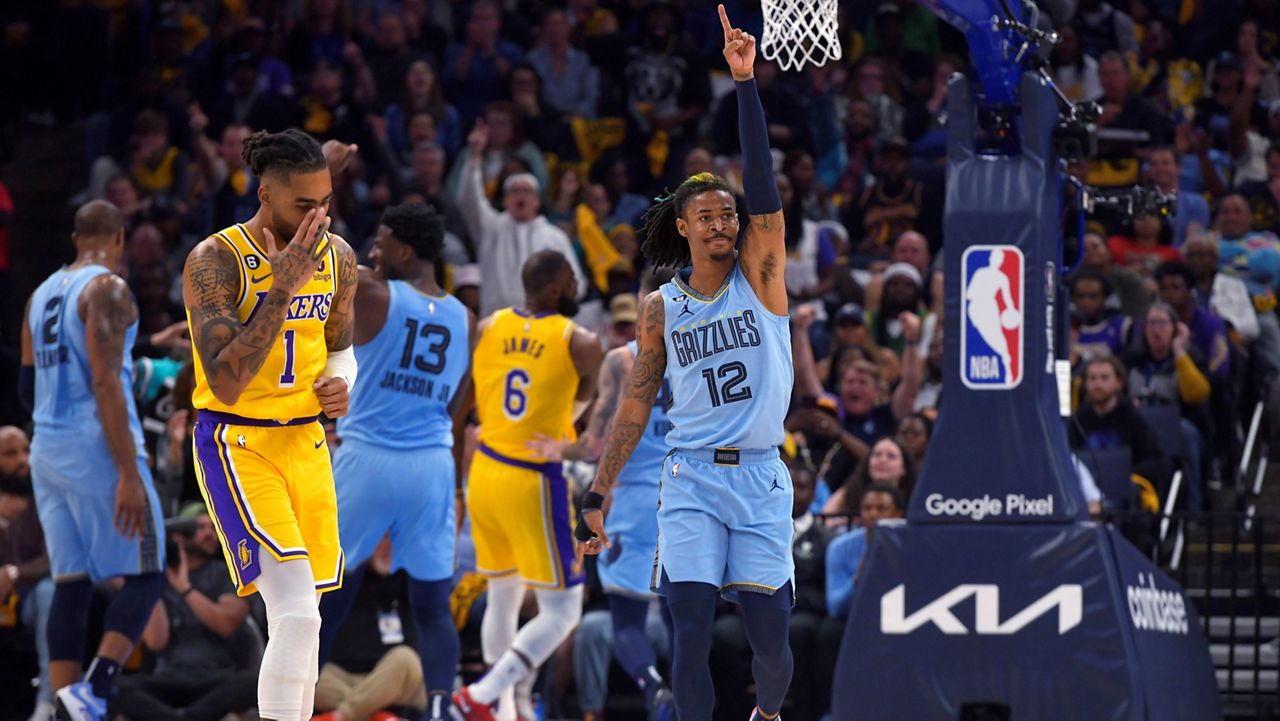 Ja Morant of the Memphis Grizzlies looks on before the game against