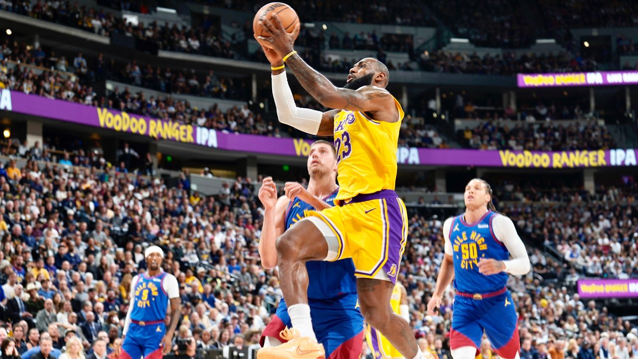 LeBron James turns up to Lakers' opener against the Nuggets in