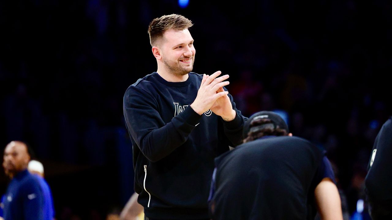 Los Angeles Lakers guard Luka Doncic is introduced before an NBA basketball game against the Golden State Warriors, Thursday, Feb. 6, 2025, in Los Angeles. (AP Photo/Kevork Djansezian)