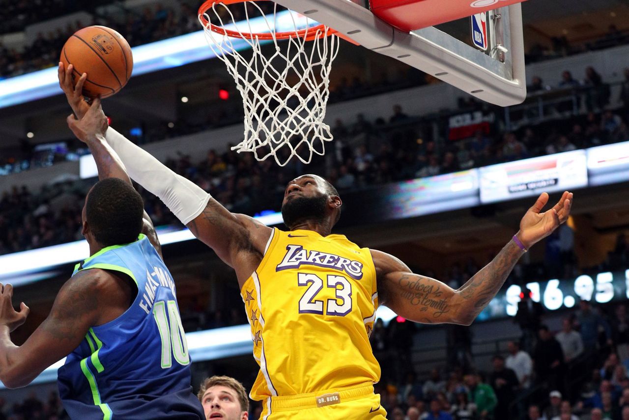 James leads Lakers over frustrated Doncic, Mavericks 129-114