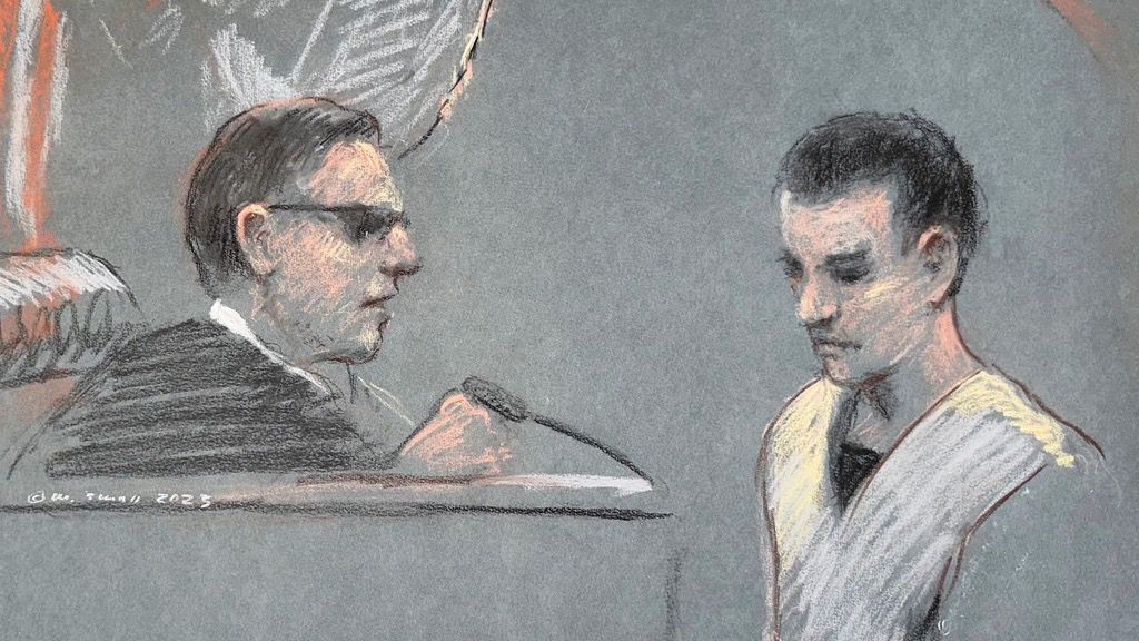 This artist depiction shows Massachusetts Air National Guardsman Jack Teixeira, right, appearing in U.S. District Court in Boston, April 14, 2023. (Margaret Small via AP)