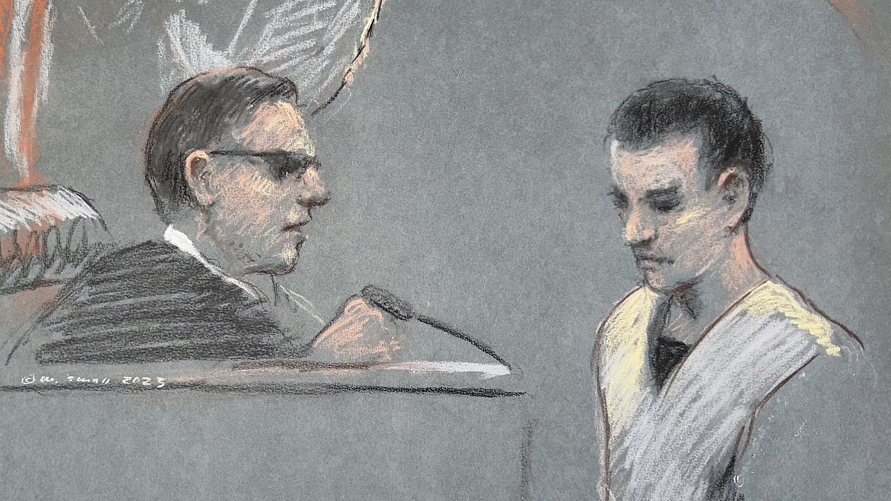 This artist depiction shows Massachusetts Air National Guardsman Jack Teixeira, right, appearing in U.S. District Court in Boston, April 14, 2023. (Margaret Small via AP)