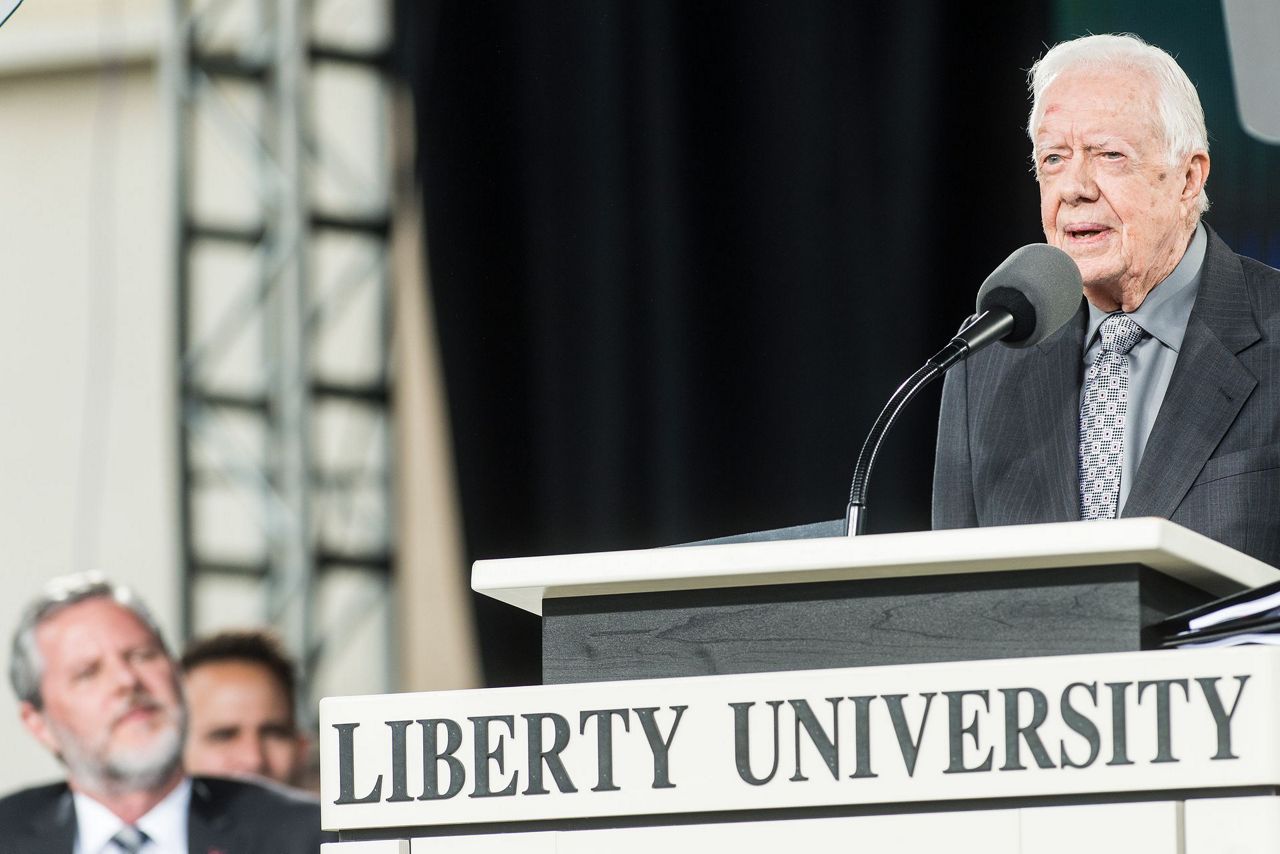 Jimmy Carter gently jabs Trump at Liberty commencement