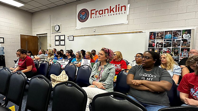 Librarians listen as fellow librarians spoke at the Franklin Co. Schools Board meeting Monday night.