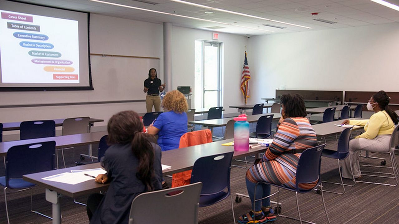 People attend a class provided by the St. Louis County Library. Beginning in August, a new business program will be offered for those who are formerly incarcerated at the Natural Bridge Library branch. (Photo Credit: St. Louis County Library)