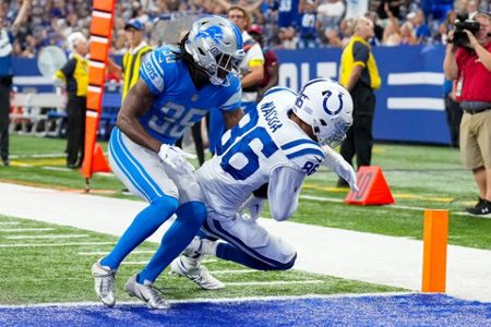 Indianapolis Colts cornerback Anthony Chesley (47) breaks up a pass to Detroit  Lions wide receiver Kalil Pimpleton (83) during first half of an NFL  preseason football game in Indianapolis, Saturday, Aug. 20