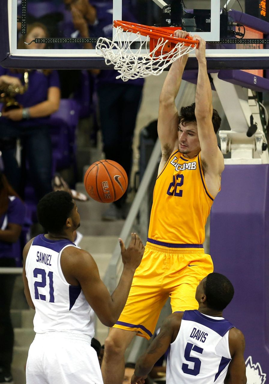 stuns No. 18 TCU 7364 for 1st win over Top 25 team