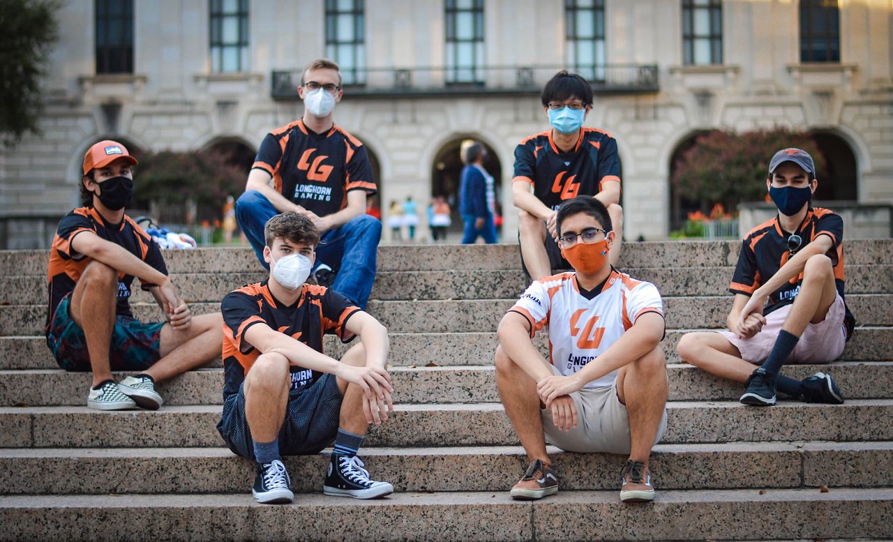 League of Legends team pictured on steps. (Spectrum News 1)