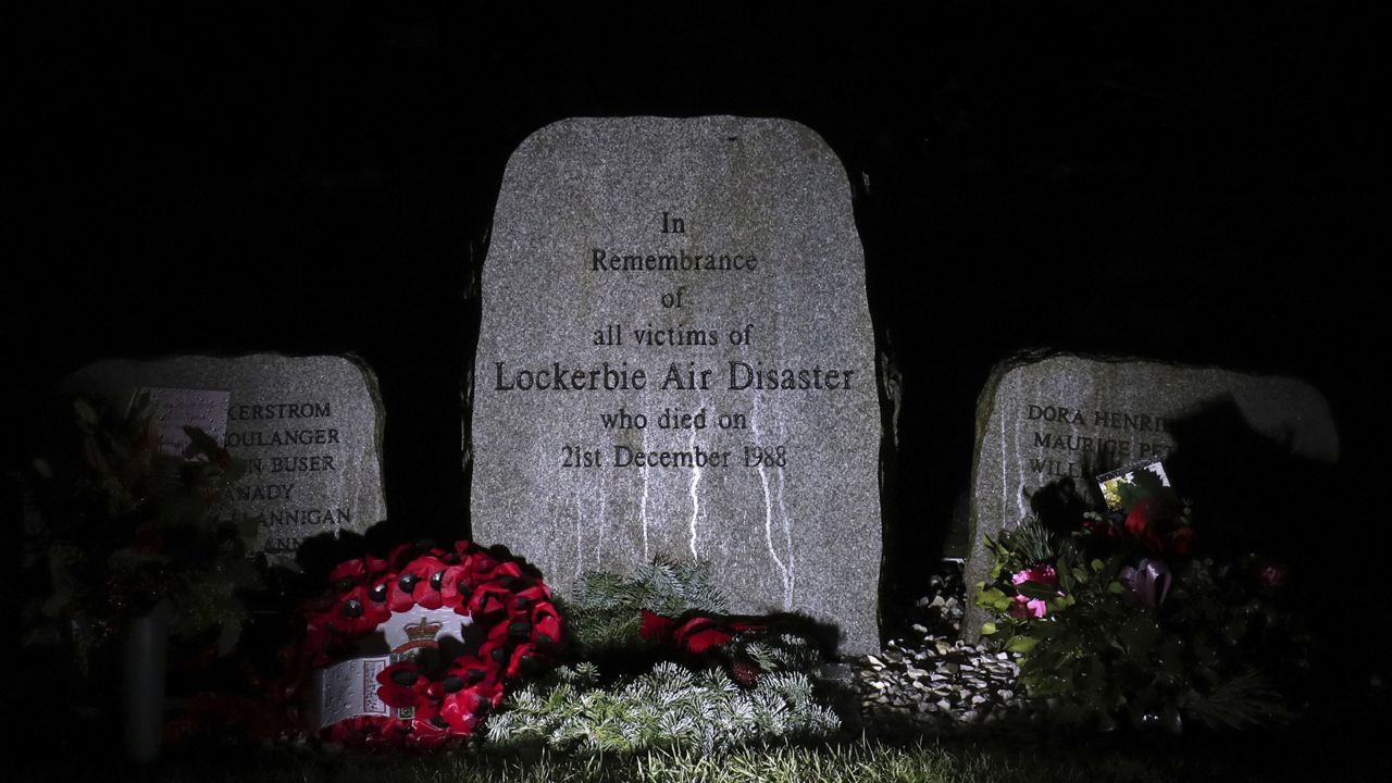 pan am 103 remembrance memorial stone at night