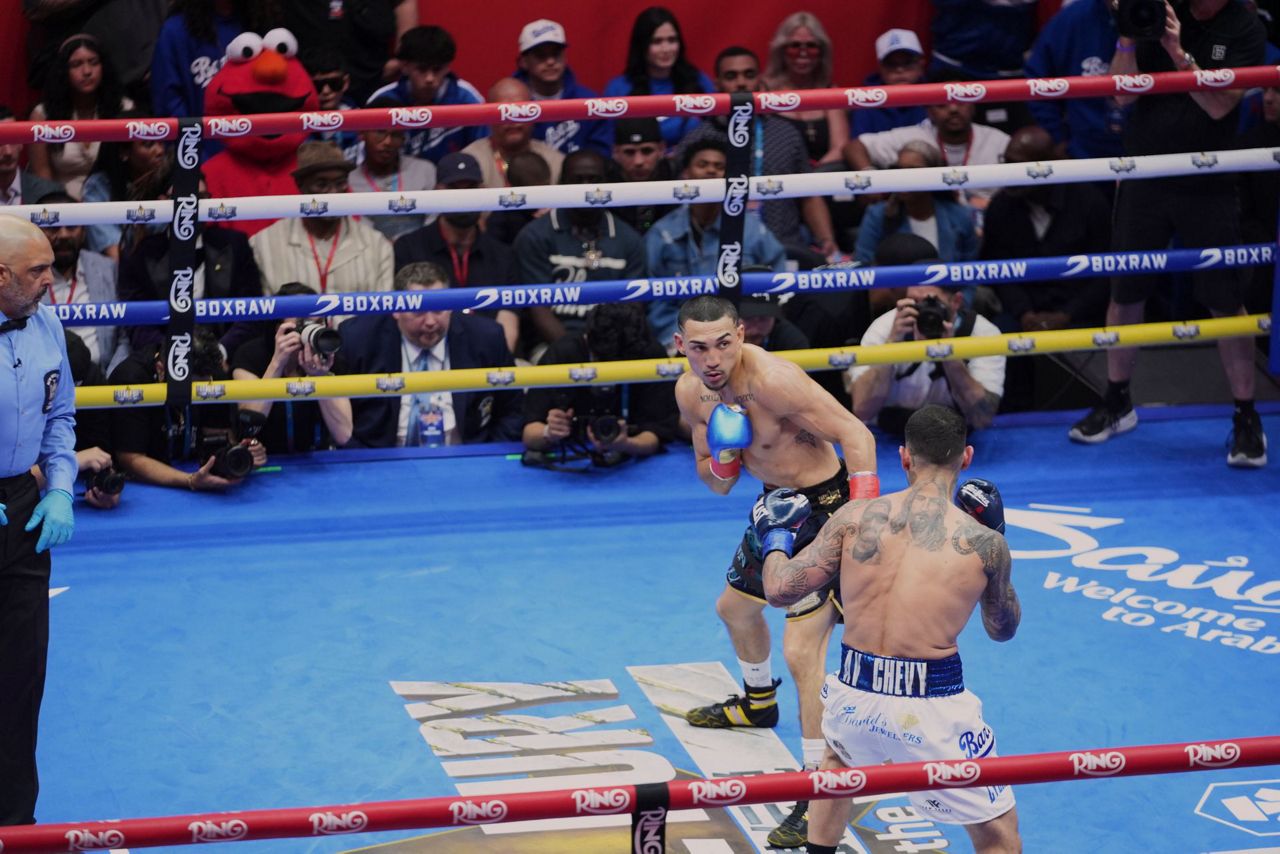 Times Square boxing event sees Teofimo Lopez defend his title, with