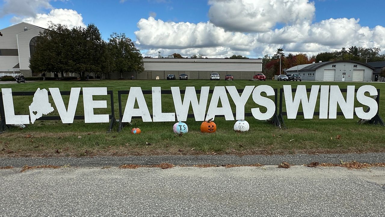 The Love Always Wins sign greets visitors to Just-in-Time Recreation in Lewiston. (Spectrum News/Susan Cover)