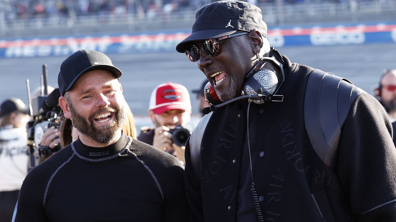 23XI Racing co-owner Michael Jordan celebrates a win by his driver Tyler Reddick after a NASCAR Cup Series auto race at Talladega Superspeedway, Sunday, April 21, 2024, in Talladega. Ala. (AP Photo/Butch Dill)