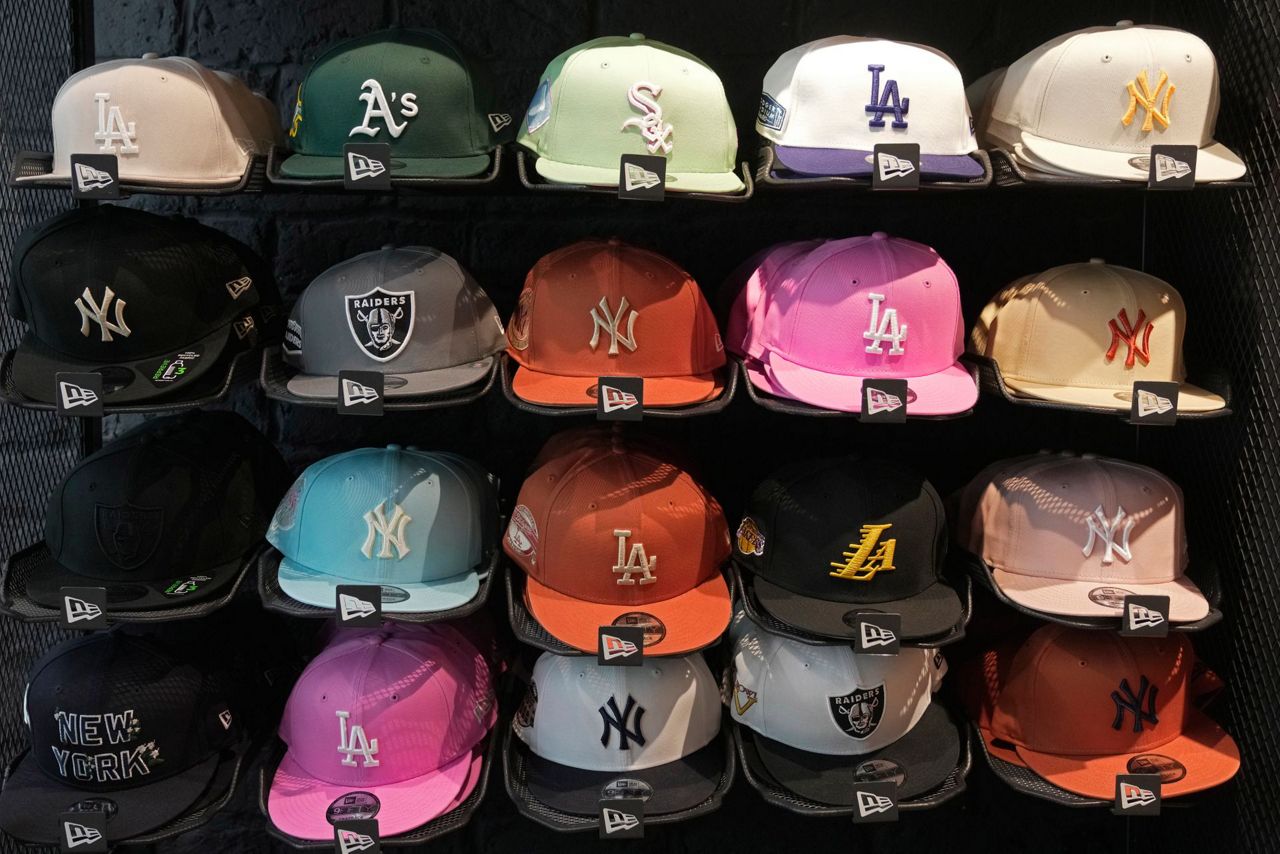 From Yankees caps to unbuttoned jerseys, MLB is hoping fashion fuels