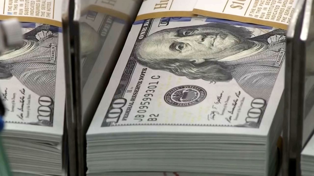 Experts say borrowing money for big purchases may become more expensive
