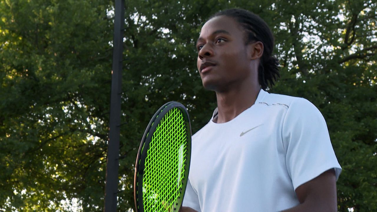 Malcolm Moore is spreading his passion for tennis to Ghana. (Adam Rossow/Spectrum News) 