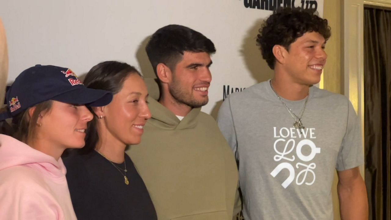 Emma Navarro, right, Jessica Pegula, Carlos Alcaraz and Ben Shelton pose ahead of The Garden Cup in New York City. (Spectrum News NY1)