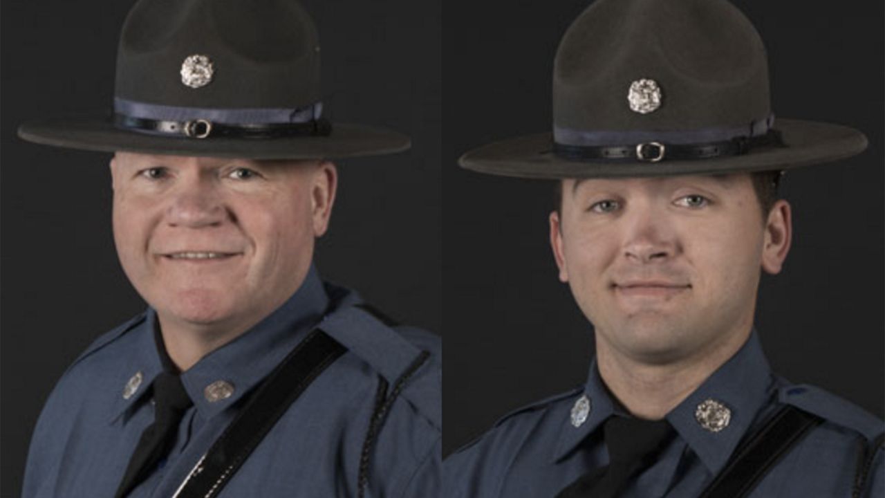 Missouri State Highway Patrol officers Sgt. Greg Weddle, left, and Cpl. Shawn Blackston, were recently recognized for their work in solving a 13-year child abduction case. 