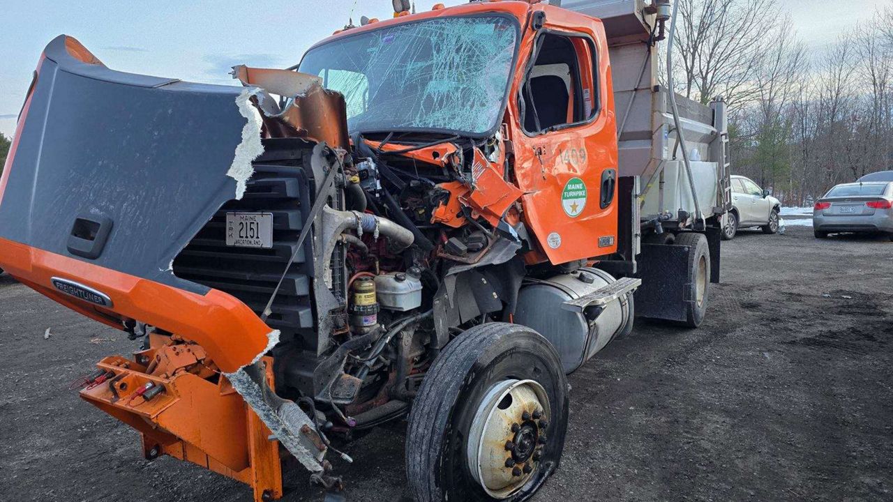 A Maine Turnpike Authority truck hauling a trailer to shield highway workers was struck and damaged Wednesday in Gardiner. (Maine Department of Public Safety)