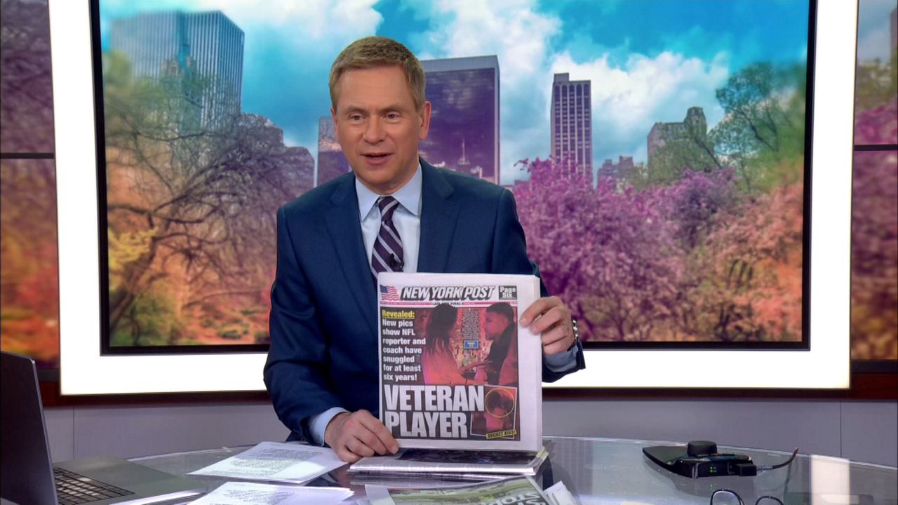 Pat Kiernan with a newspaper. 