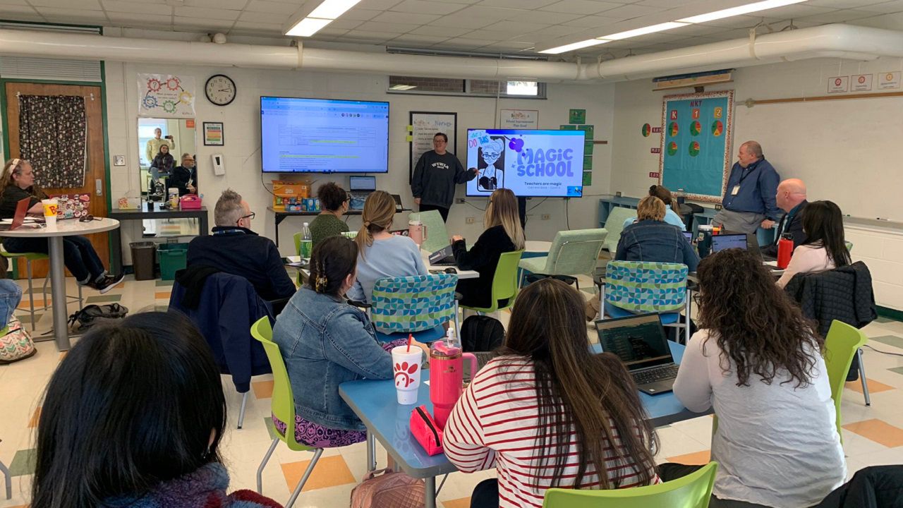 Cari Ann Brick demonstrates Magic School AI at a teacher leadership team meeting. (Courtesy: Dan Gridley)