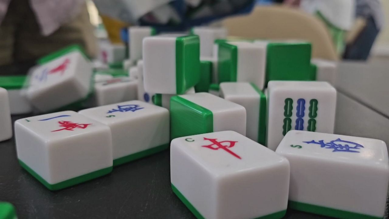 Players set up their tiles at a mahjong club in Baldwin Park. (Spectrum News/Chris Hare)