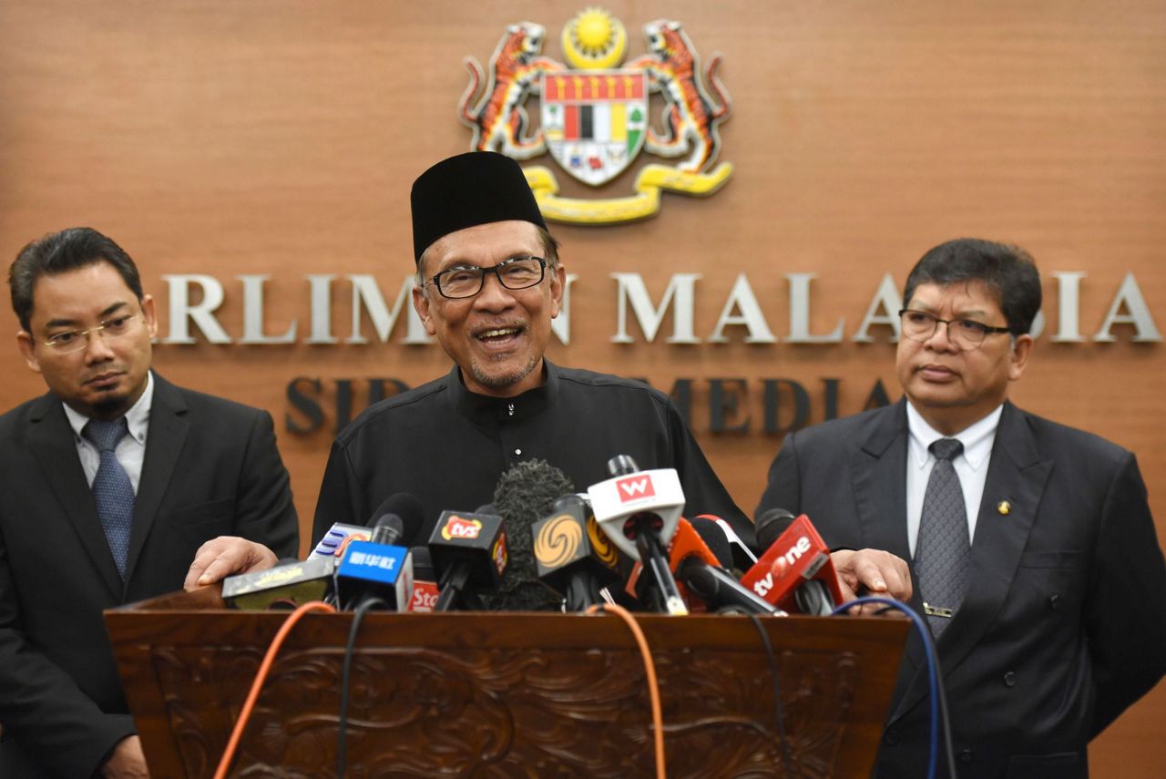 Malaysian PM-in-waiting Anwar takes oath as lawmaker