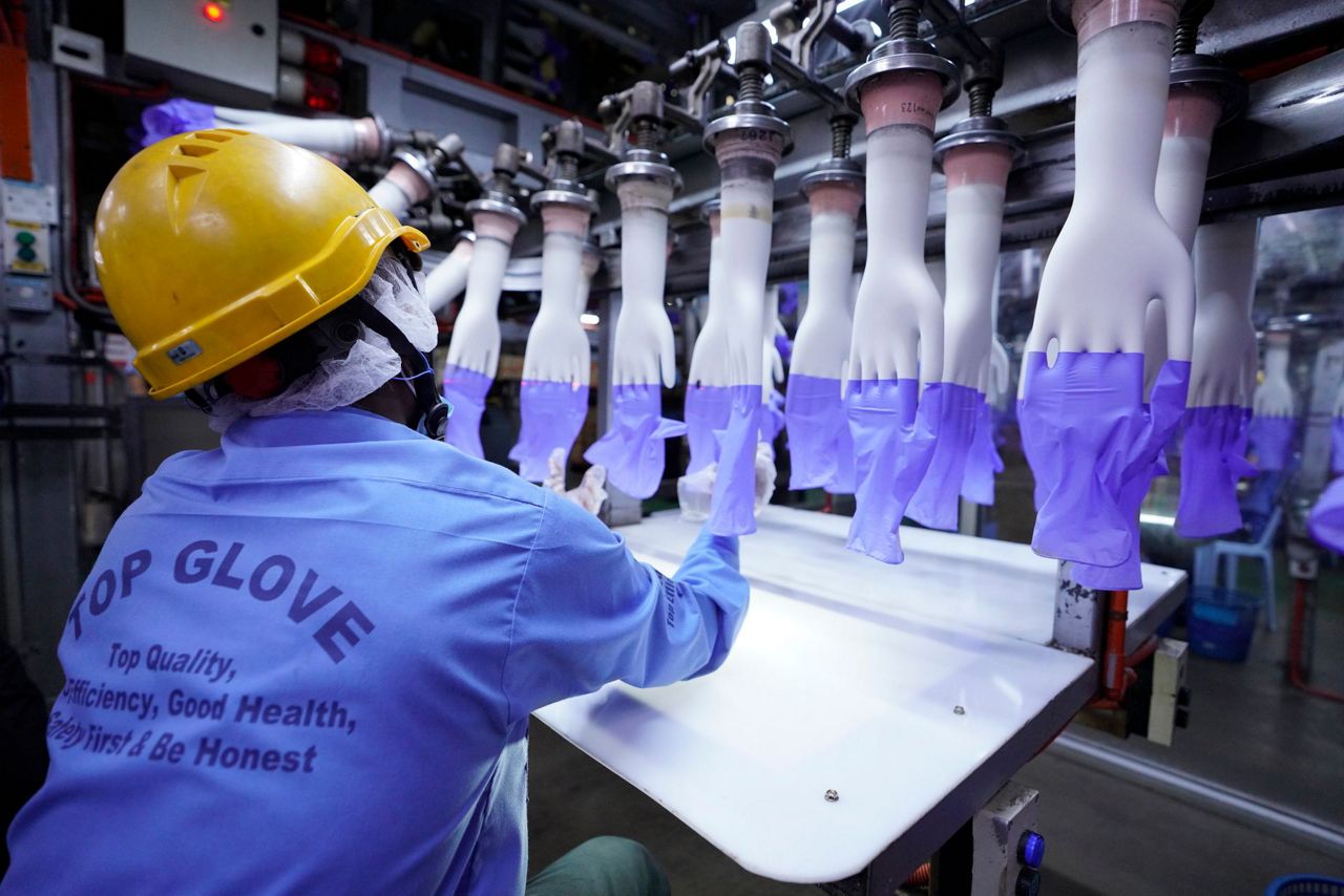 Malaysia's Top Glove says virus outbreak may push prices up