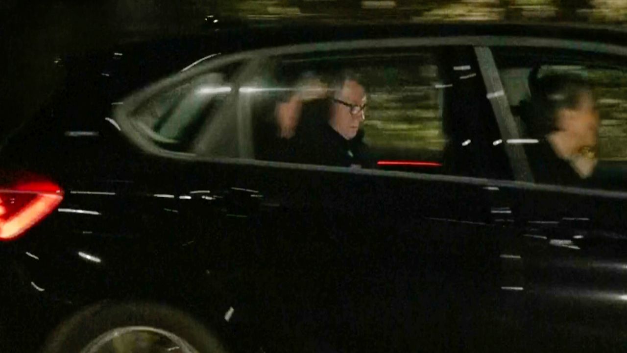 In this photo taken from video by Sky News, Britain's former ambassador to the U.S. Peter Mandelson is seen in a vehicle leaving a police station in London in the early hours of Tuesday, Feb. 24, 2026. (Sky News Exclusive via AP)