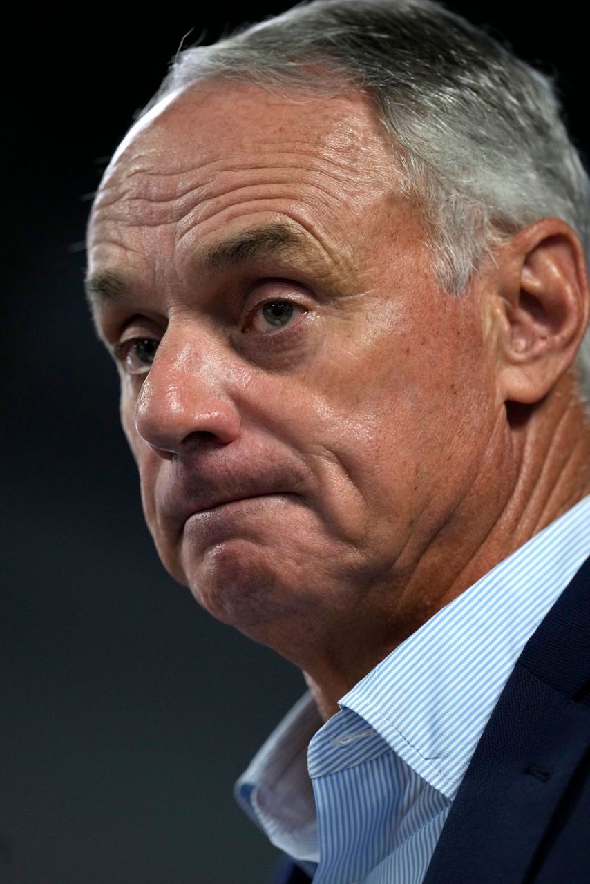 Rob Manfred says he will retire as baseball commissioner in January ...