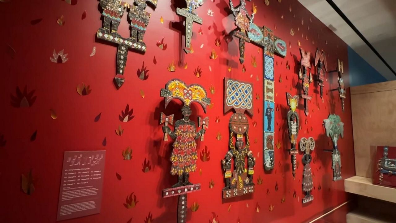 Manny Vega's work is displayed at The Museum of the City of New York through December. (Spectrum News NY1)