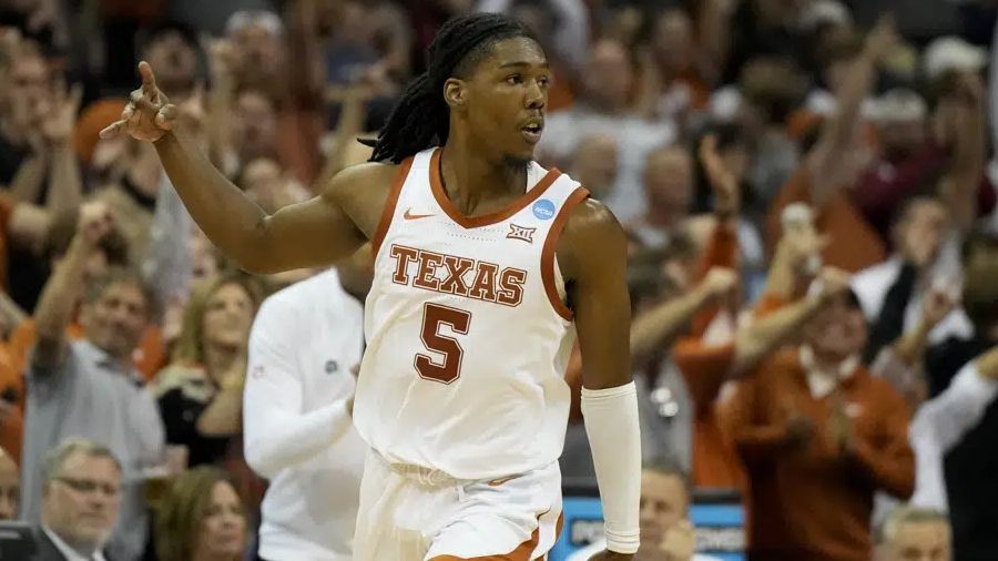 Texas guard Marcus Carr celebrates after scoring against Xavier in the second half of a Sweet 16 college basketball game in the Midwest Regional of the NCAA Tournament Friday, March 24, 2023, in Kansas City, Mo. (AP Photo/Jeff Roberson)
