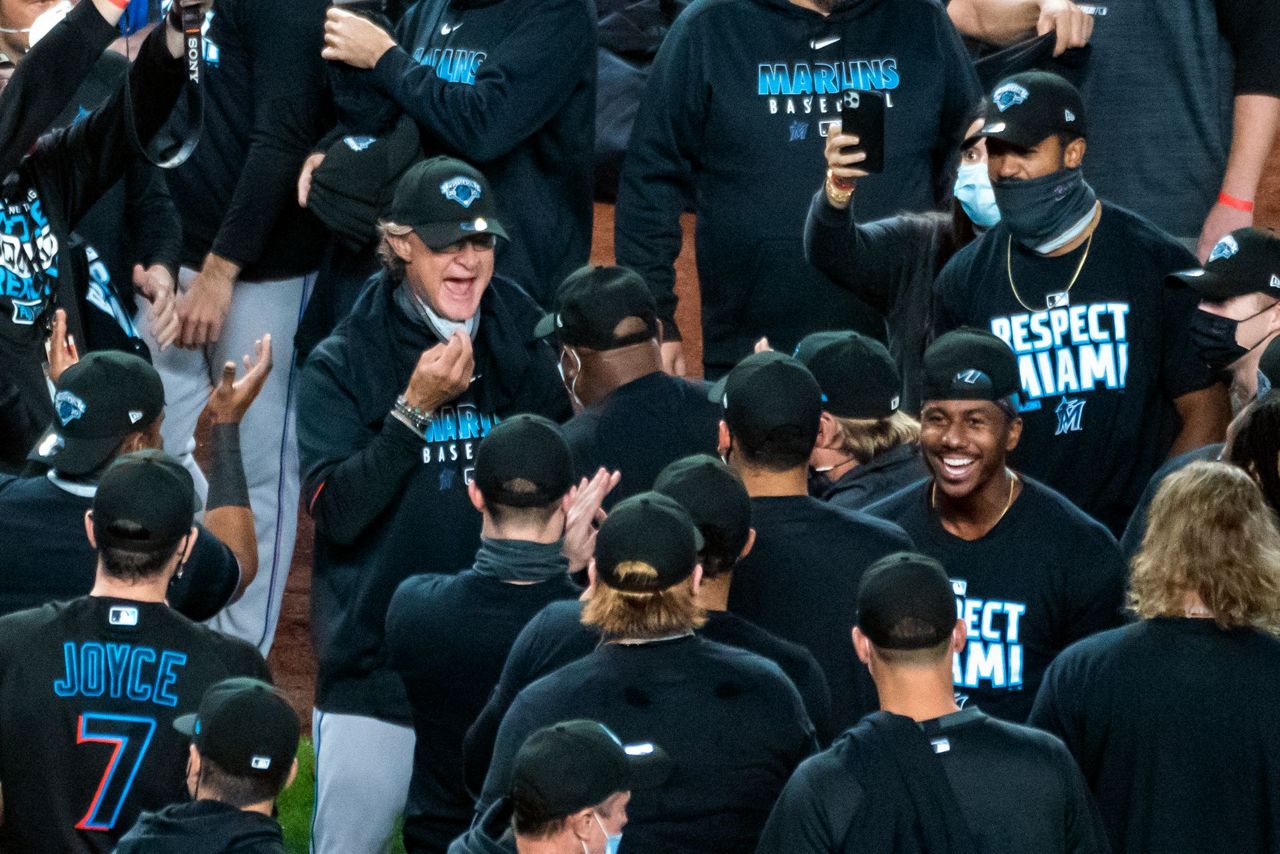 Trevor Rogers of the Miami Marlins celebrates with teammates in