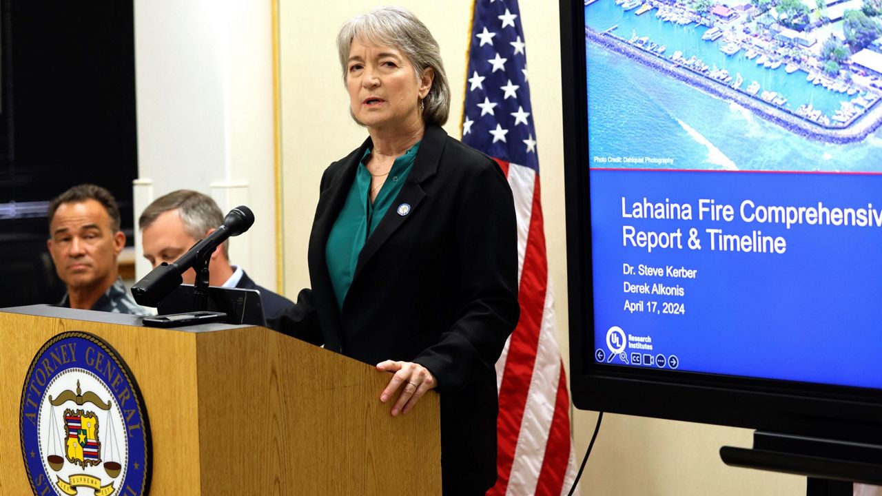 Hawaii Attorney General Anne Lopez and members of the Fire Safety Research Institute (FSRI) hold a press conference on the Maui Wildfire Phase One Report findings on Wednesday, April 17, 2024, in Honolulu. (AP Photo/Marco Garcia)