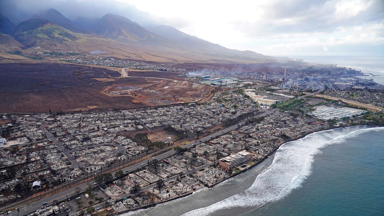 Wildfire wreckage is shown Thursday, Aug. 10, 2023, in Lahaina, Hawaii. The search of the wildfire wreckage on the Hawaiian island of Maui on Thursday revealed a wasteland of burned out homes and obliterated communities as firefighters battled the stubborn blaze making it the deadliest in the U.S. in recent years. (AP Photo/Rick Bowmer)