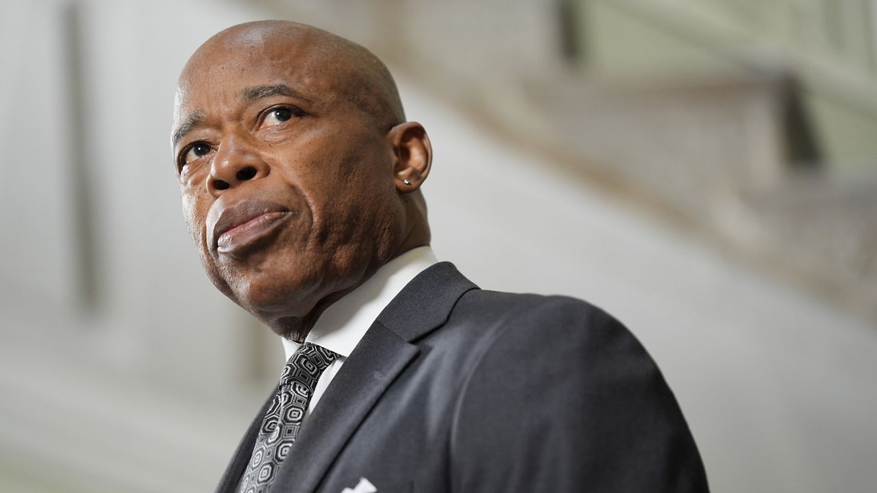 New York City Mayor Eric Adams speaks to members of the press at a news conference in New York, Monday, Sept. 16, 2024. (AP Photo/Seth Wenig)