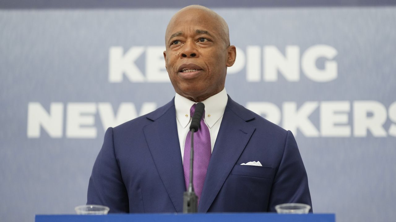 New York City Mayor Eric Adams speaks to reporters after a news conference in New York, Monday, Sept. 30, 2024. (AP Photo/Seth Wenig)