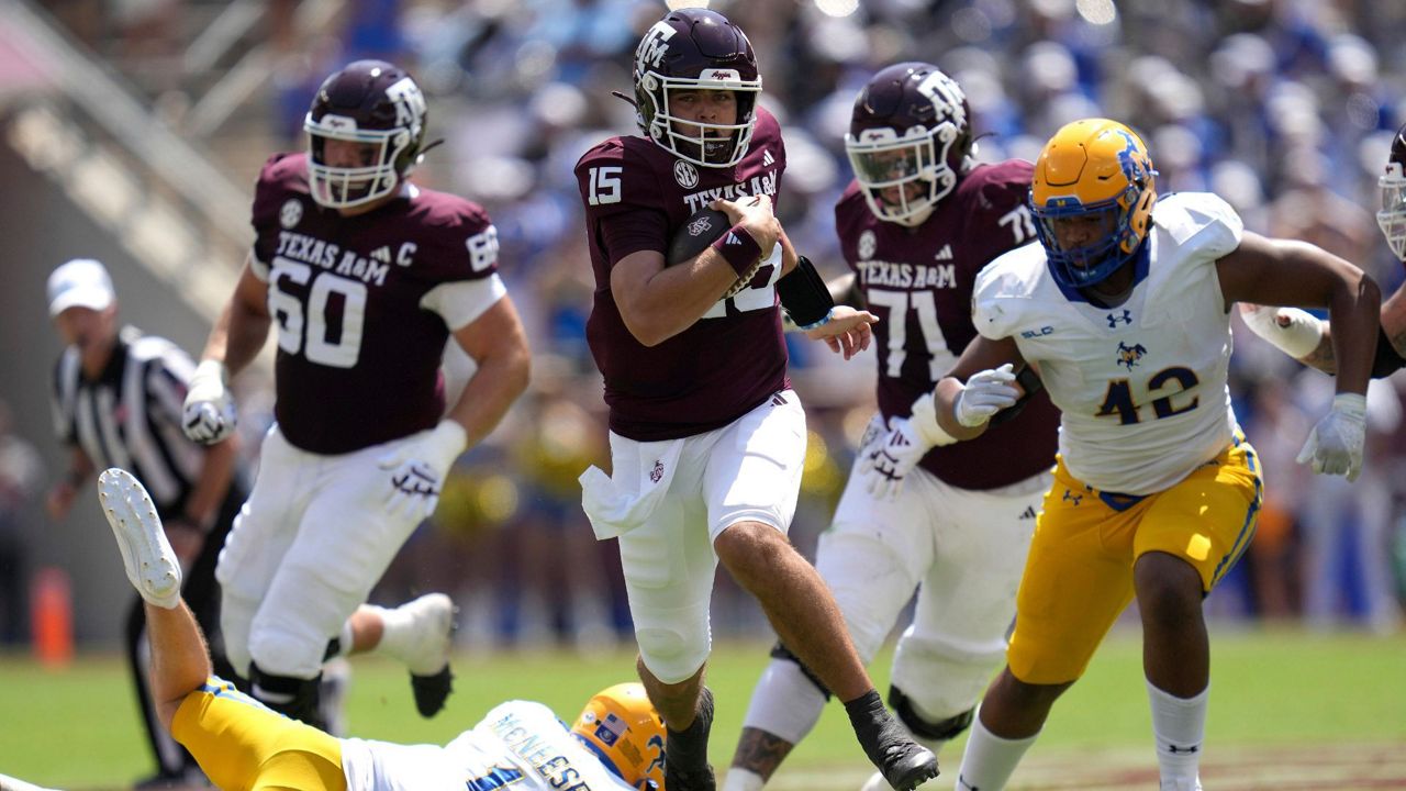 Texas A&M quarterback Conner Weigman (15) scrambles out of the pocket during the first half of an NCAA college football game against McNeese State, Saturday, Sept. 7, 2024, in College Station, Texas. (AP Photo/Sam Craft)