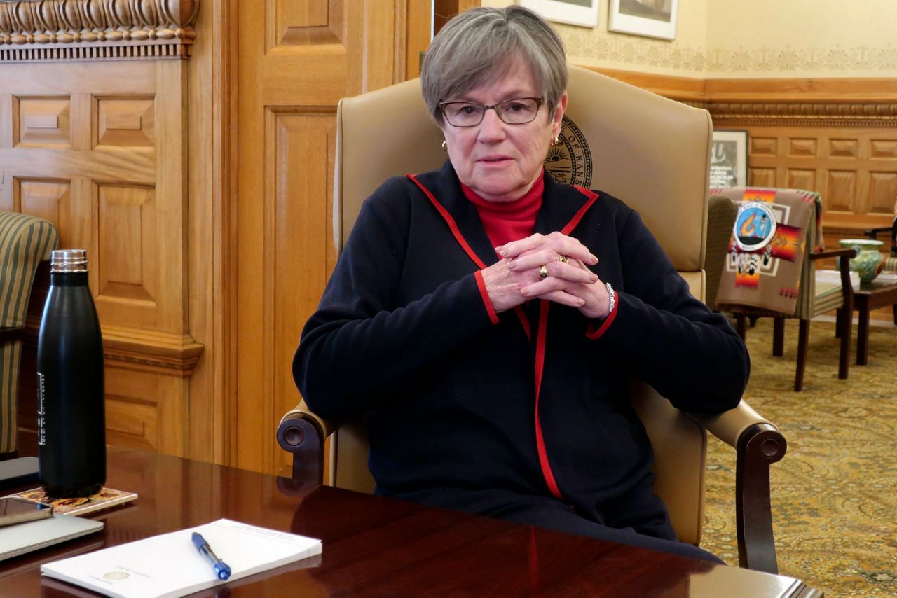 A push to expand Medicaid has Kansas governor embracing politics and ...