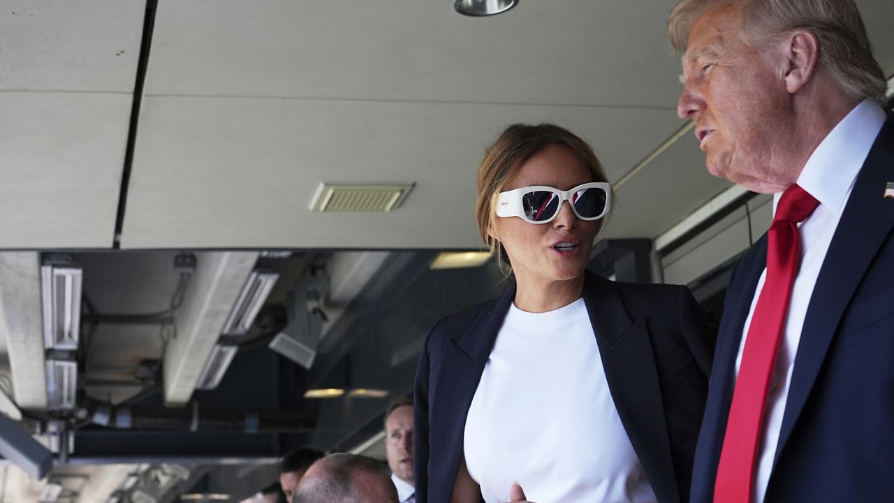 President Donald Trump, right, and first lady Melania Trump attend the Club World Cup final soccer match, at MetLife Stadium in East Rutherford, N.J., Sunday, July 13, 2025. (AP Photo/Jacquelyn Martin)